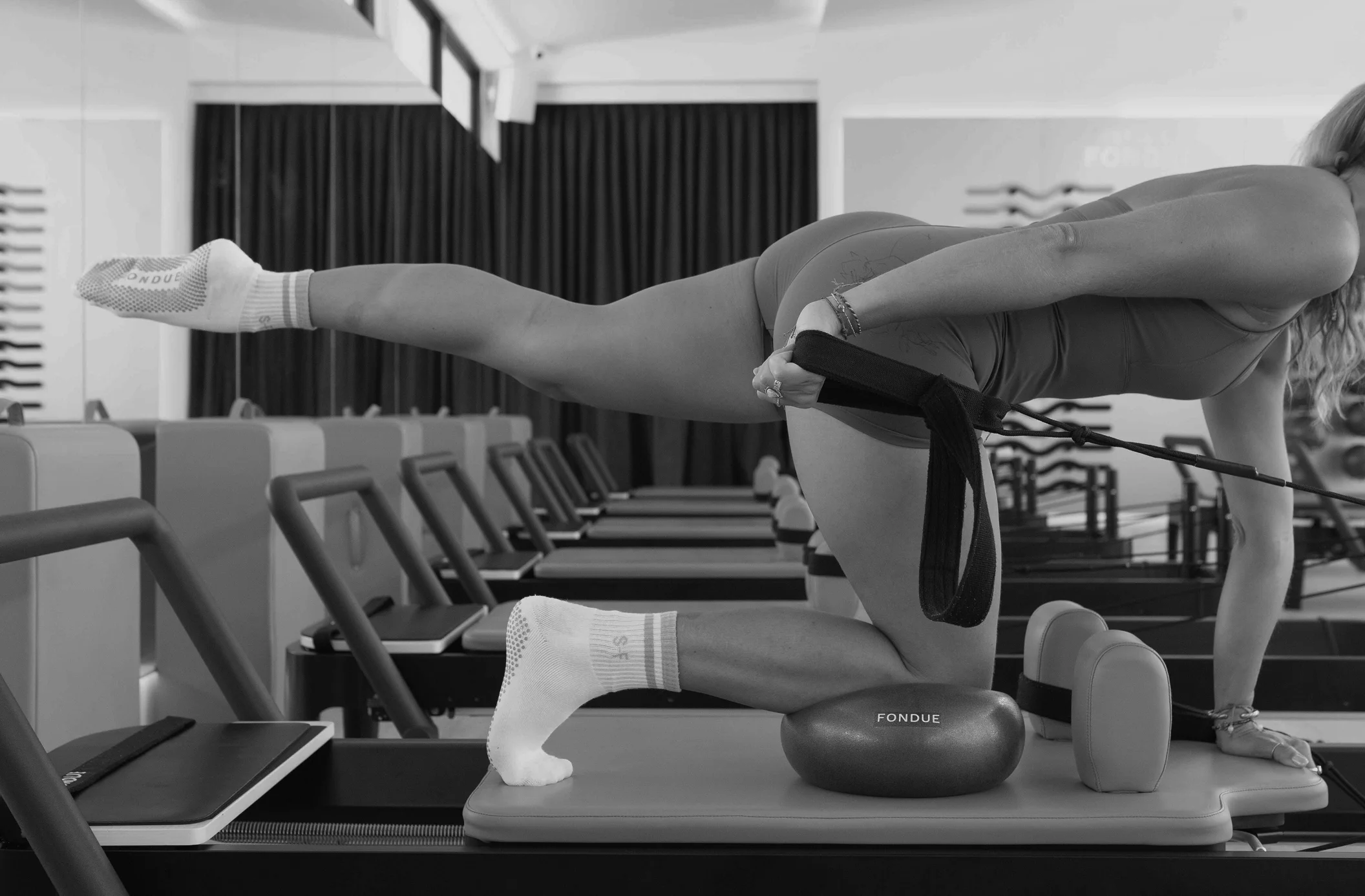 Reformer Progressive Pilates Class at Studio Fondue
